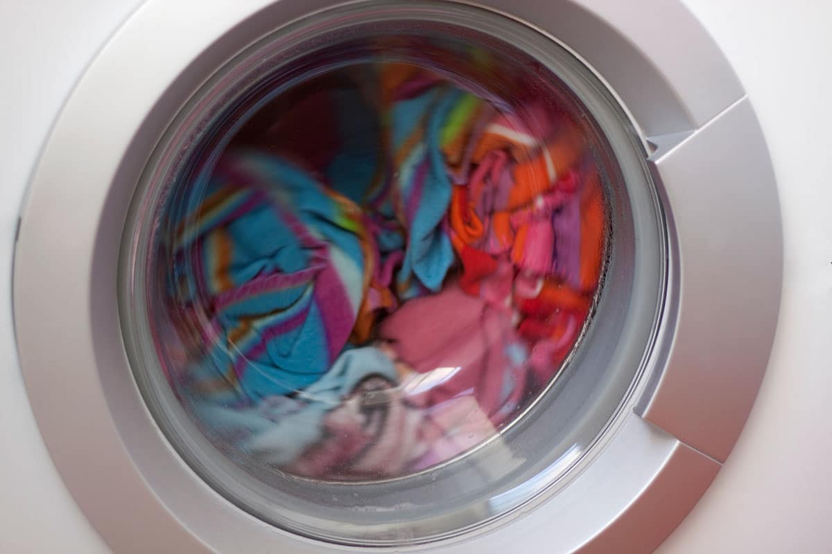 school uniforms in a washing machine