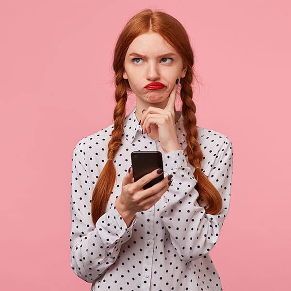 red headed woman with long braids