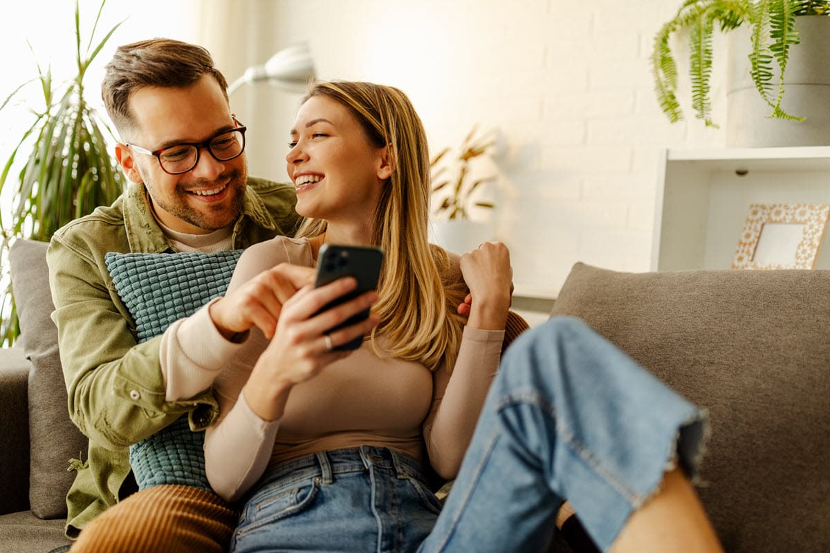 couple on the couch on a facetime call