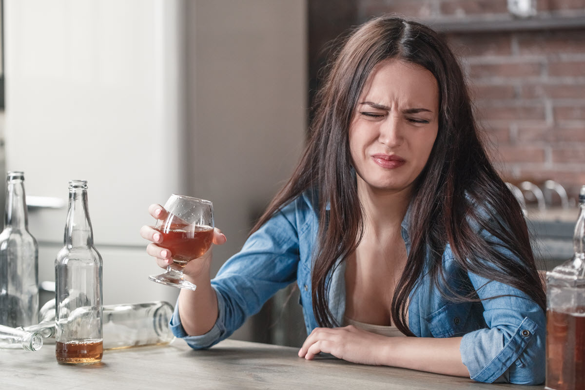 girl drinking alcohol who doesn't like the taste