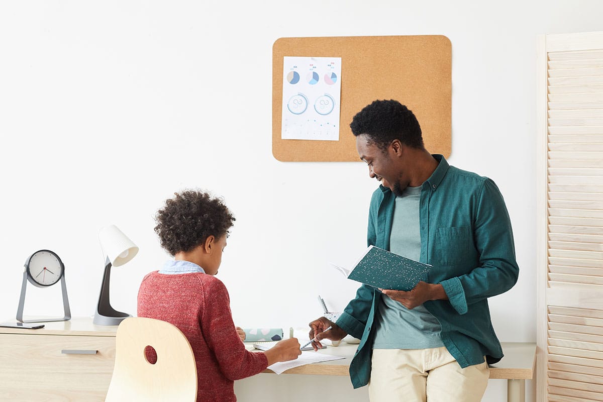 man teaching an insubordinate child who wants to learn and doesn't have an excuse to question authority